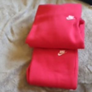Red Nike sweat suit